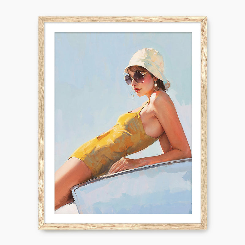 Framed artwork of a woman in a yellow swimsuit and hat against a blue sky.